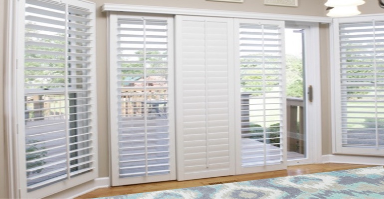 [Polywood|Plantation|Interior ]211] shutters on a sliding glass door in Atlanta